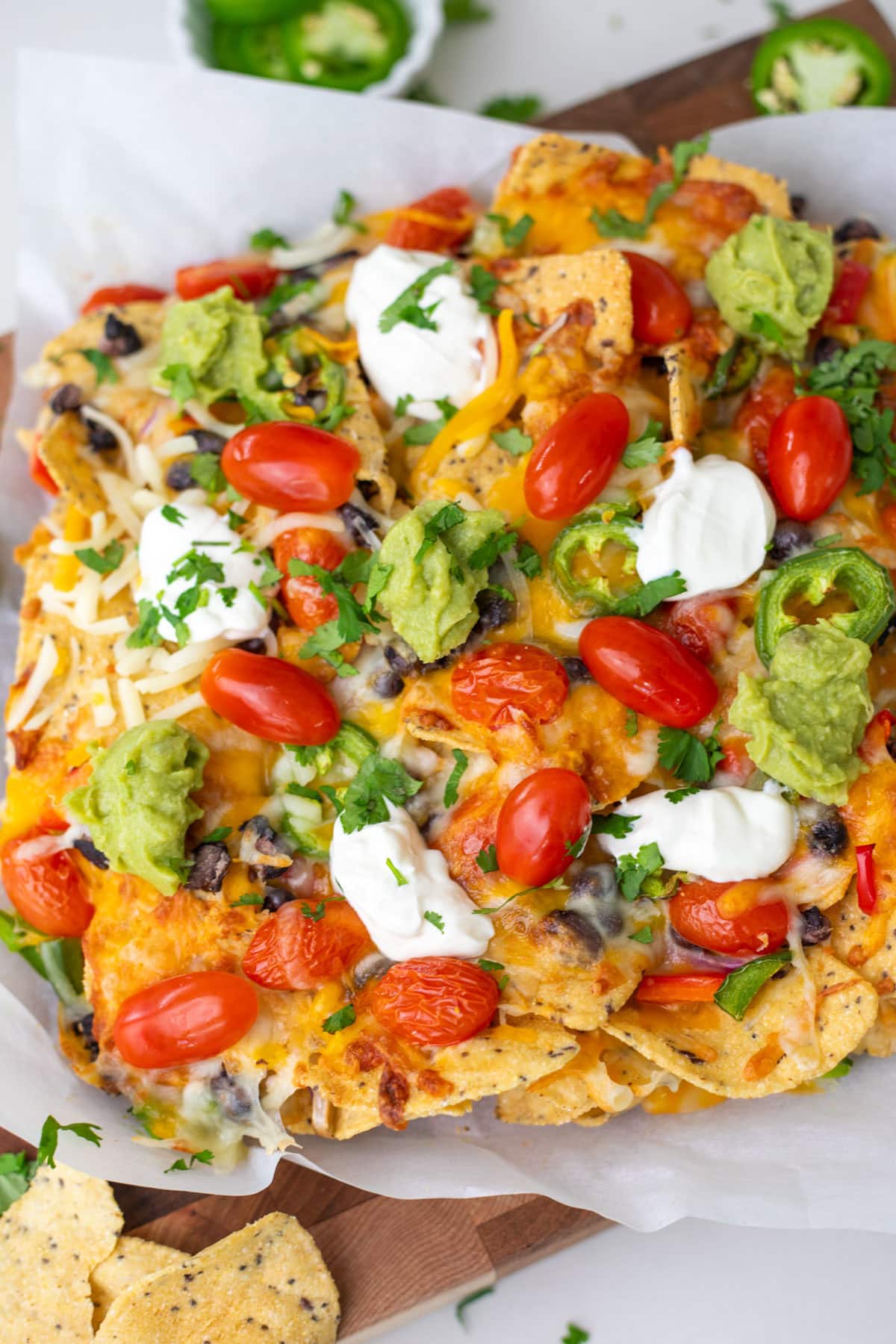 closeup shot of air fryer nachos topped with cilantro