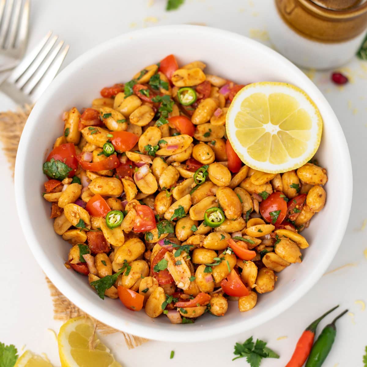 Peanut chaat with lemon and cilantro as toppings