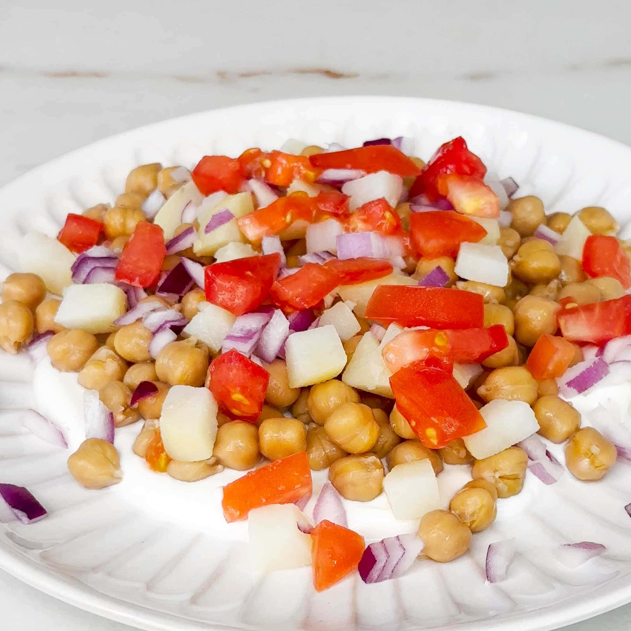 add tomato to make chana chaat recipe