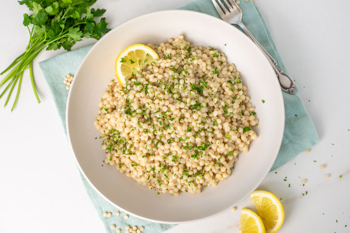 Instant Pot Couscous on a white plate, ready to serve