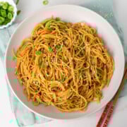 ready to serve garlic noodles on a white plate