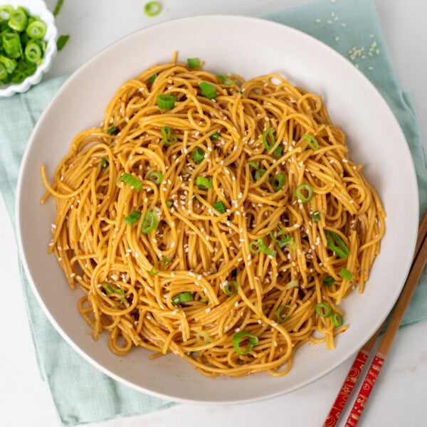 ready to serve garlic noodles on a white plate