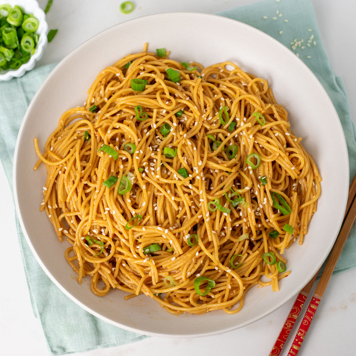 ready to serve garlic noodles on a white plate