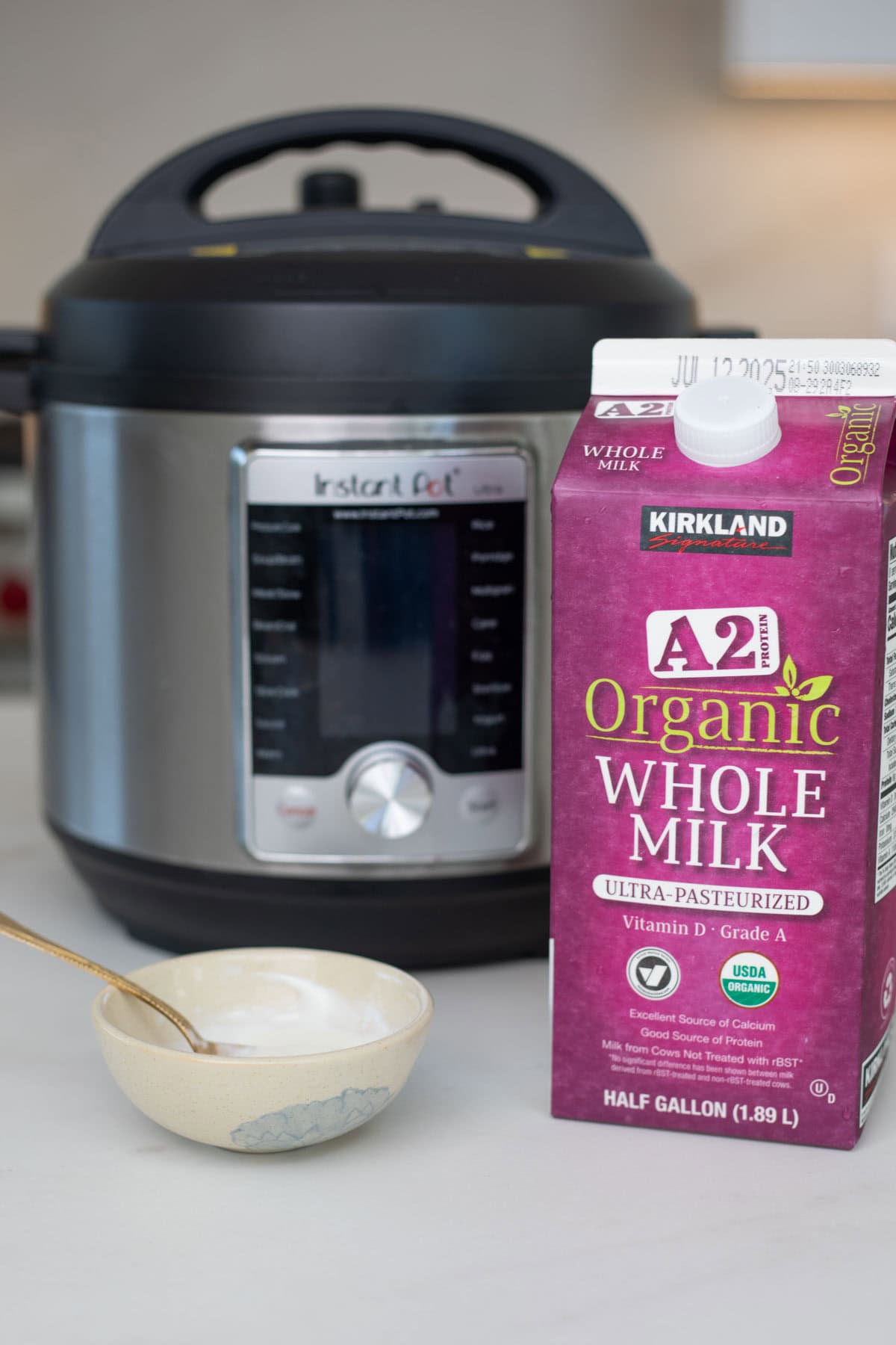 Ingredients and equipment to make instant pot yogurt. 