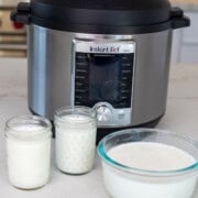 Instant pot yogurt set in a bowl and jars.
