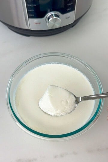 Instant pot yogurt in a glass bowl.