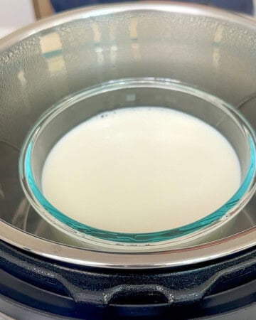 Heating milk in a bowl in the instant pot to make yogurt.