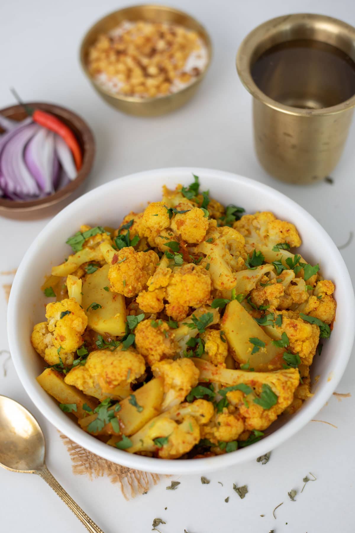 A bowl of aloo gobi ready to serve