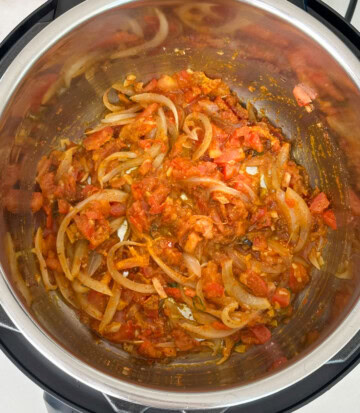 mixed ingredients in instant pot for aloo gobi recipe