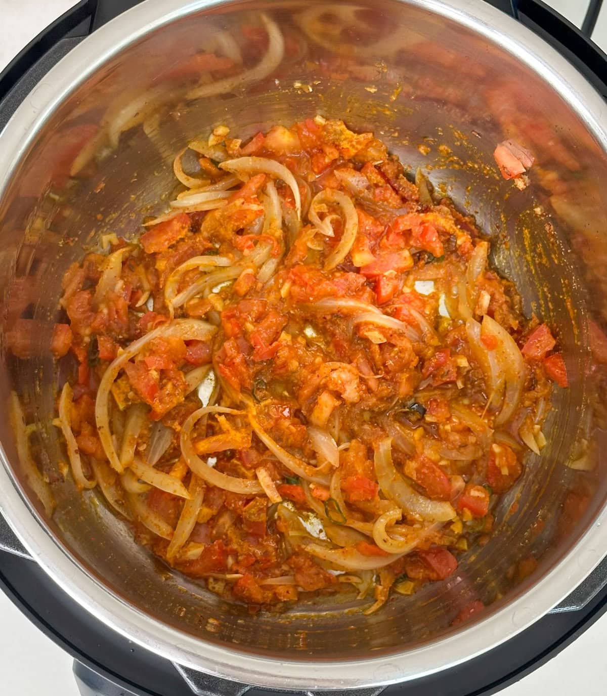 mixed ingredients in instant pot for aloo gobi recipe