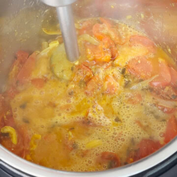 Blend ingredients using hand mixer to make paneer butter masala