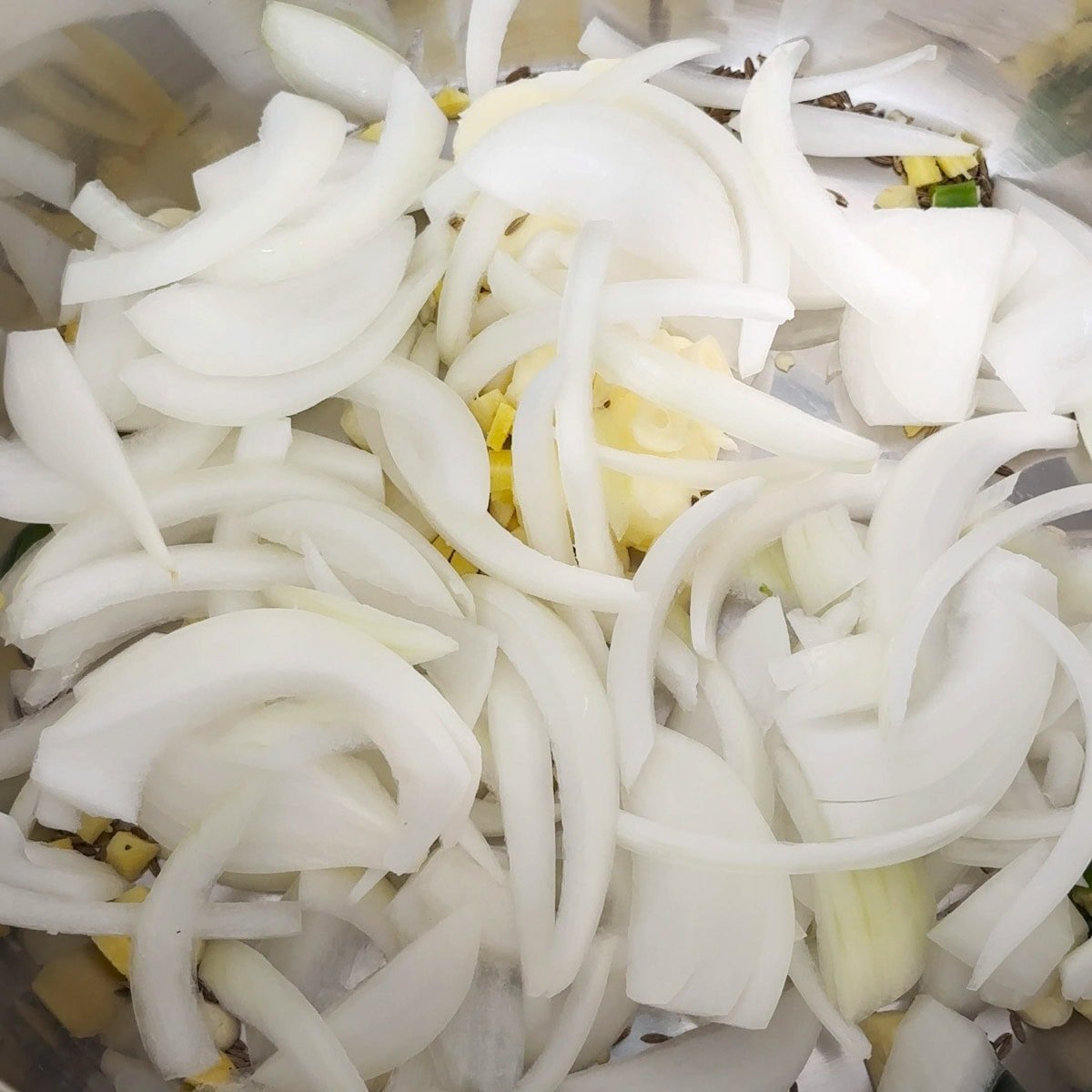 Add onions to make paneer butter masala