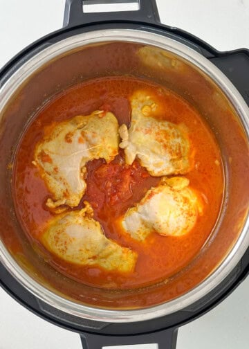 Add water into the instant pot for butter chicken recipe