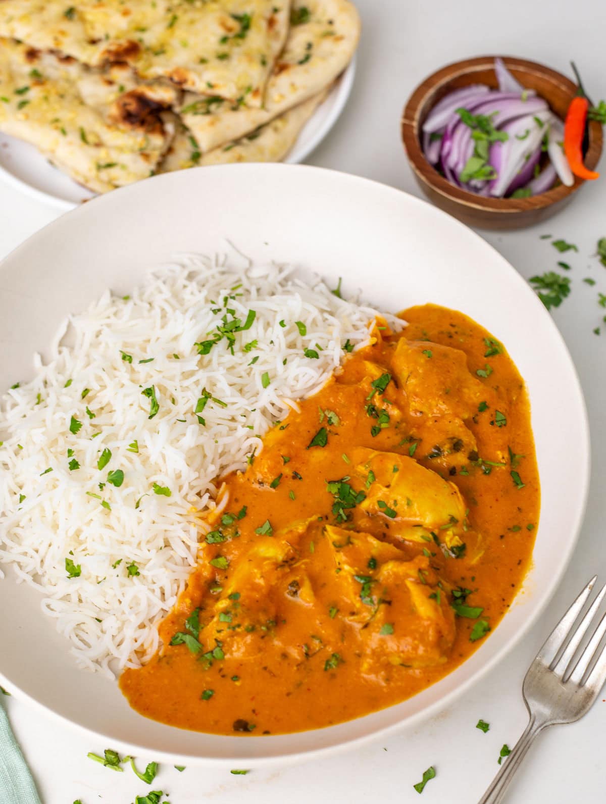 Closeup shot of butter chicken on a plate