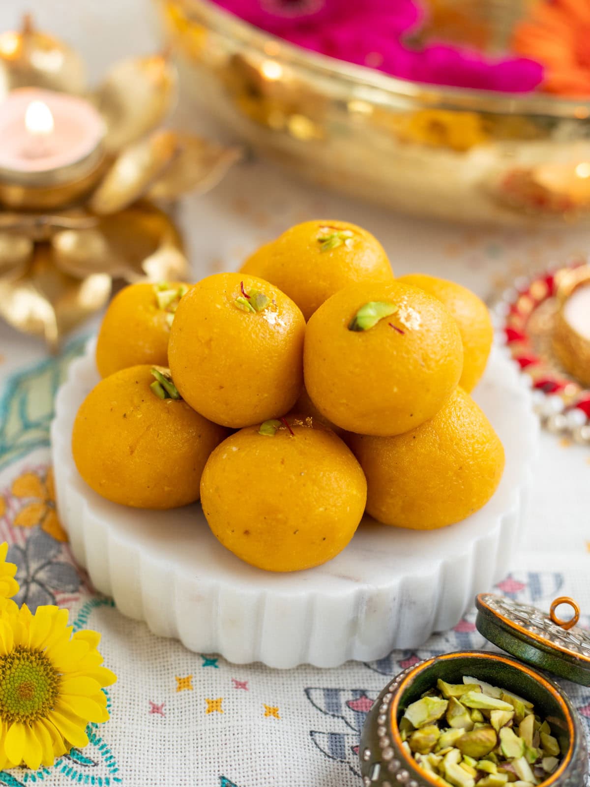 Mango Coconut Almond Ladoo on a marble platter
