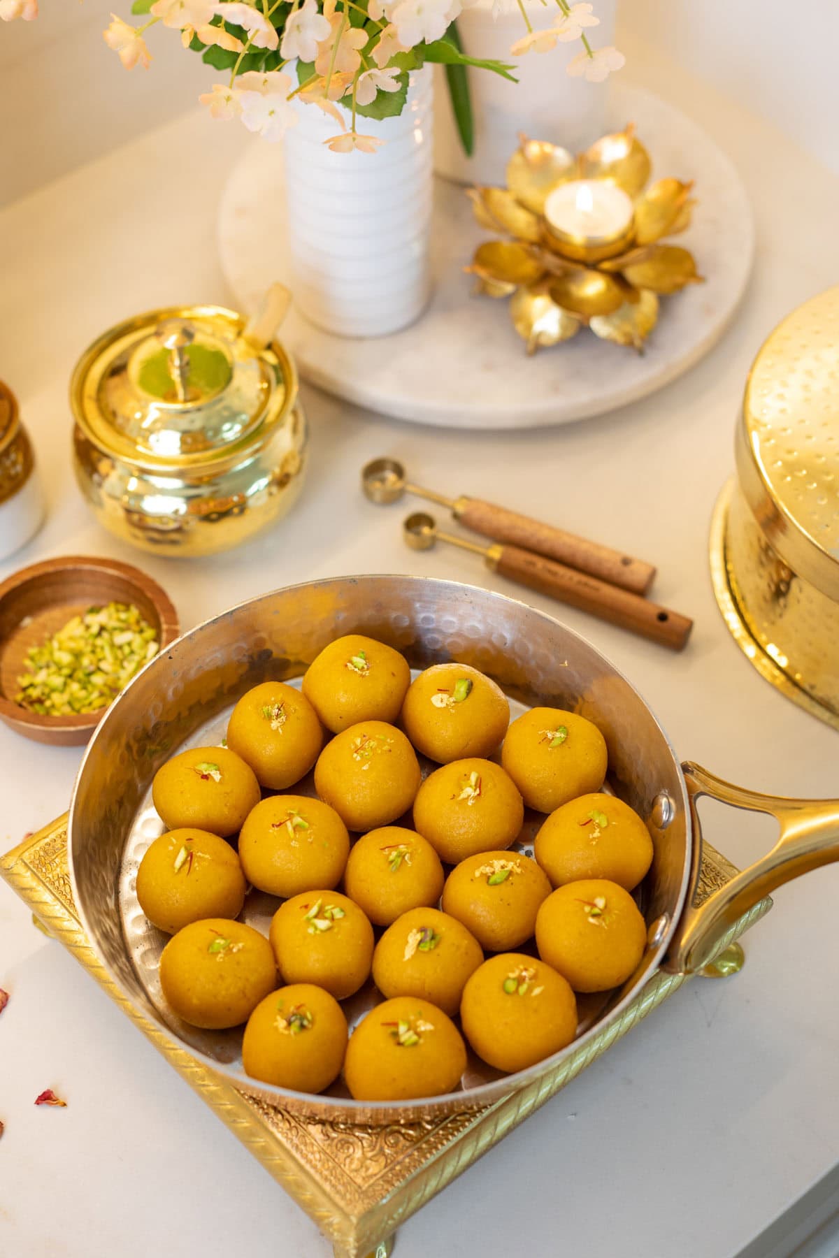 Soft Mango Coconut Almond Ladoo in a pan