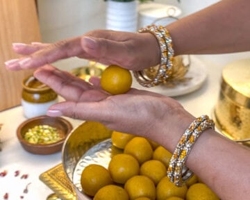 Roll Mango Coconut Almond Ladoo by hand
