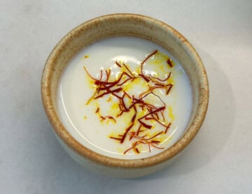 Saffron strands added to milk