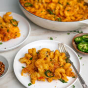 Mac and cheese in a saucer with fork