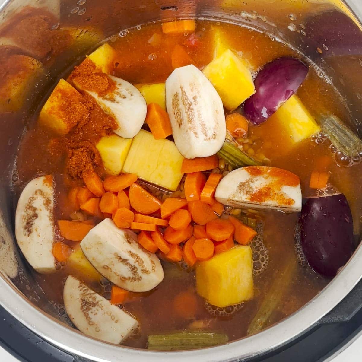 Add all ingredients including lentils and veggies to make sambar.