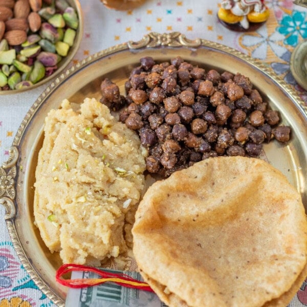 Ashtami prasad of chana, puri and halwa.