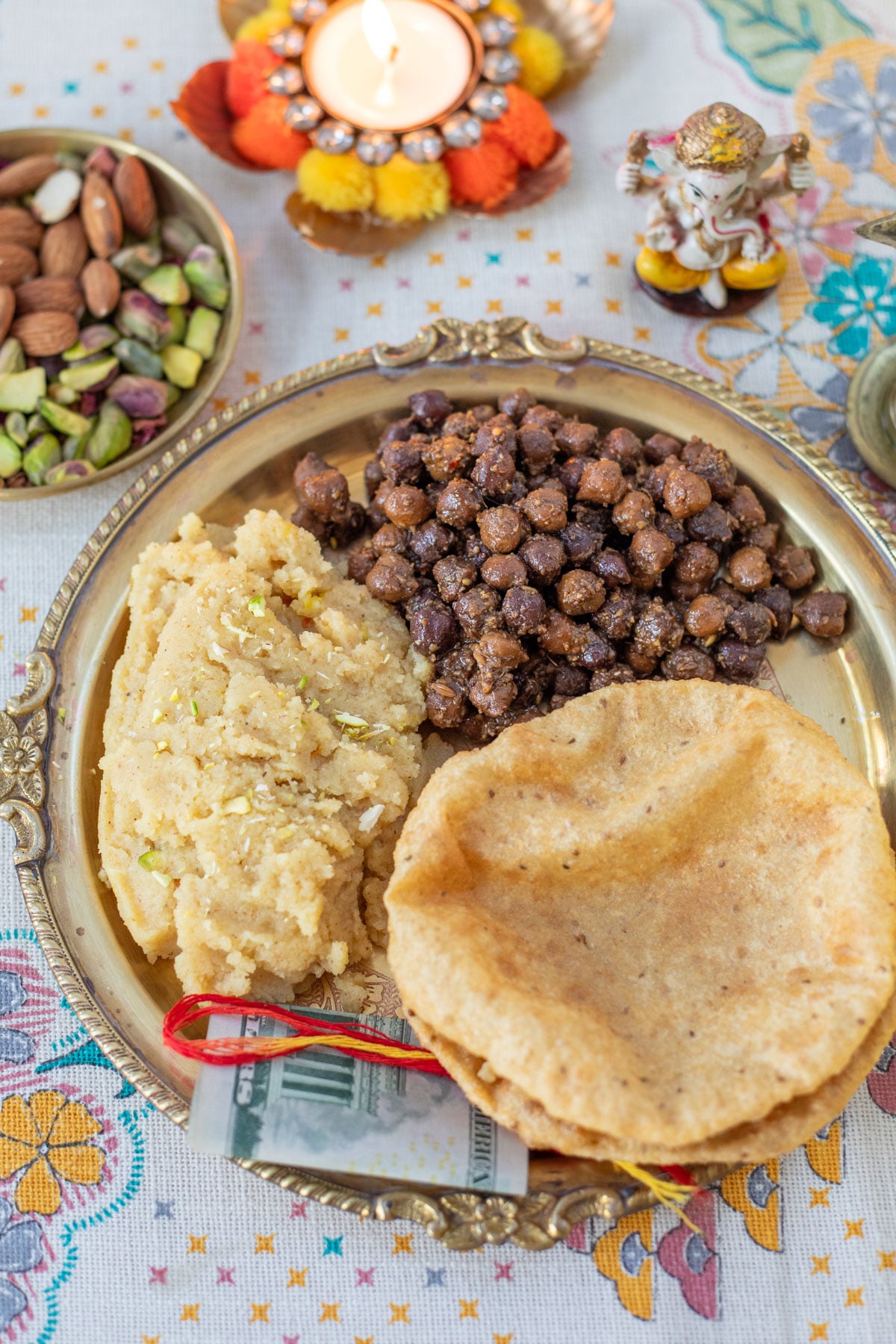 Ashtami prasad of chana, puri and halwa.