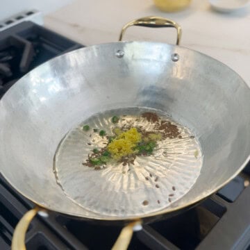 Saute cumin, ginger and chili for kala chana recipe