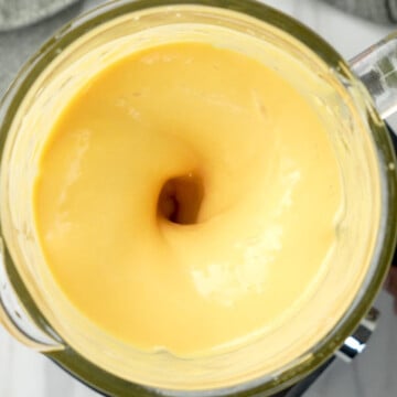 Blend mango, yogurt, and other ingredients to make it smooth for mango overnight oats recipe