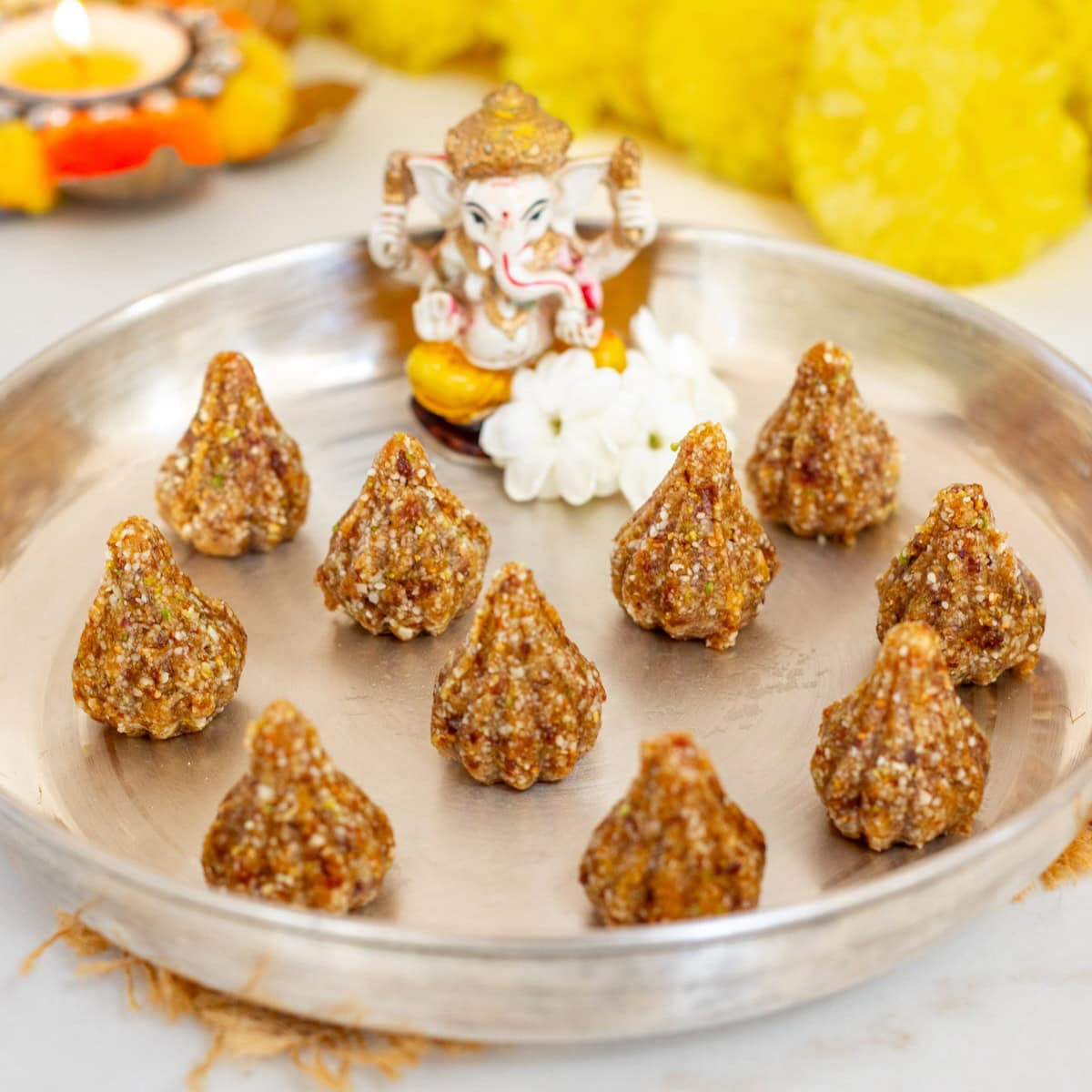 No added sugar dry fruit modak served to ganpati bappa