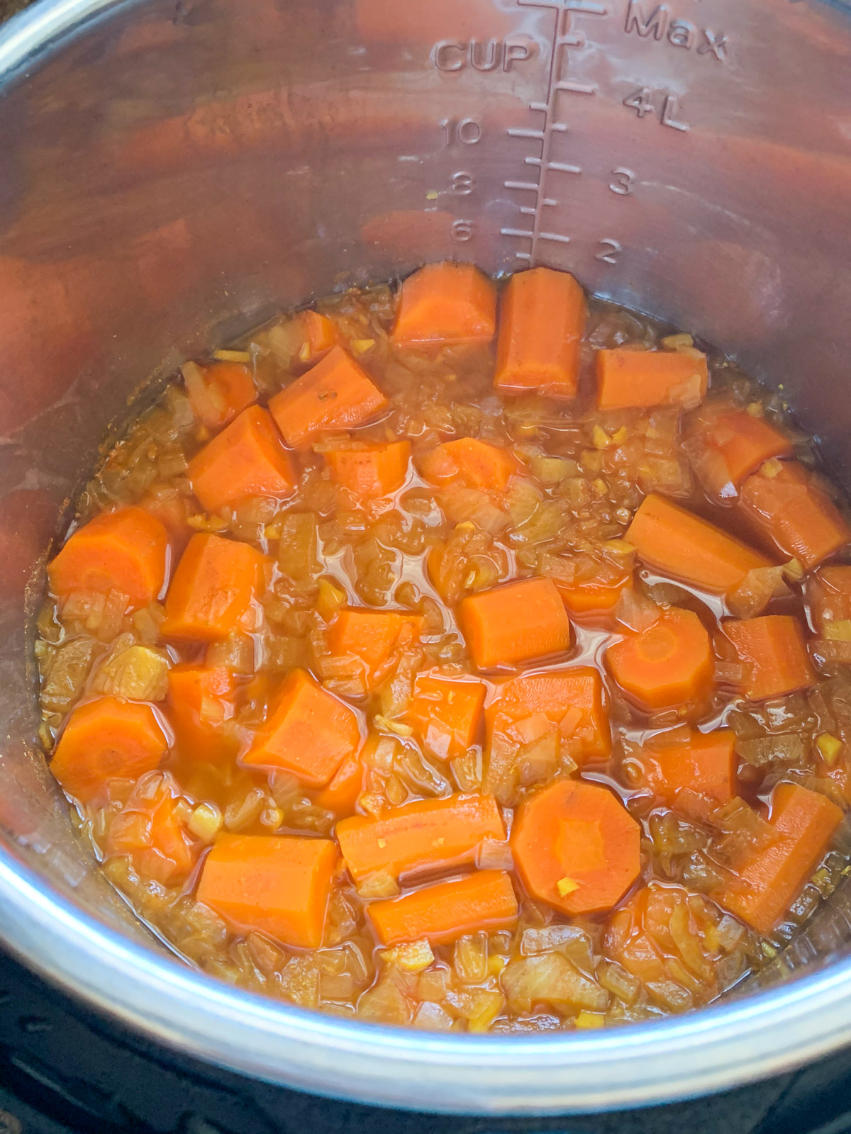Cooked ingredients to make carrot ginger soup in InstantPot